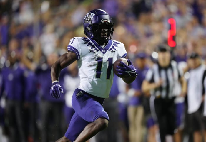 Sep 2, 2022; Boulder, Colorado, USA; TCU Horned Frogs wide receiver Derius Davis (11) carries the ball for a touchdown in the fourth quarter against the Colorado Buffaloes at Folsom Field. Mandatory Credit: Ron Chenoy-USA TODAY Sports